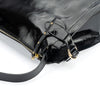Cartera de cuero riciatto negro, línea estructurada con correa desmontable  cierre con cremallera y bolsillo interior, modelo Michelle marca _BRAVA, vista detalle